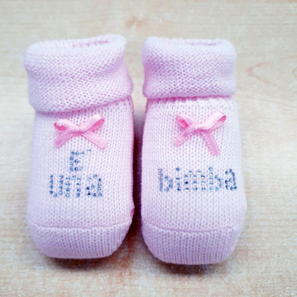 Immagine di Babbucce Rosa 100% in caldo cotone con scritta E' UNA BIMBA